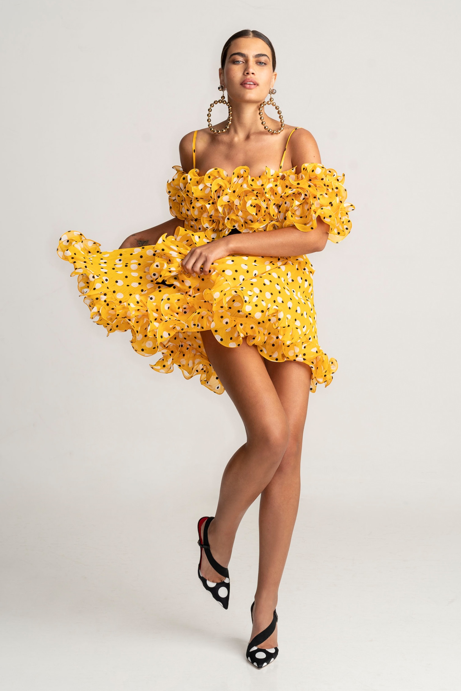 Icons of American Fashion - CAROLINA HERRERA Dress & Earrings. MANOLO BLAHNIK Pumps.