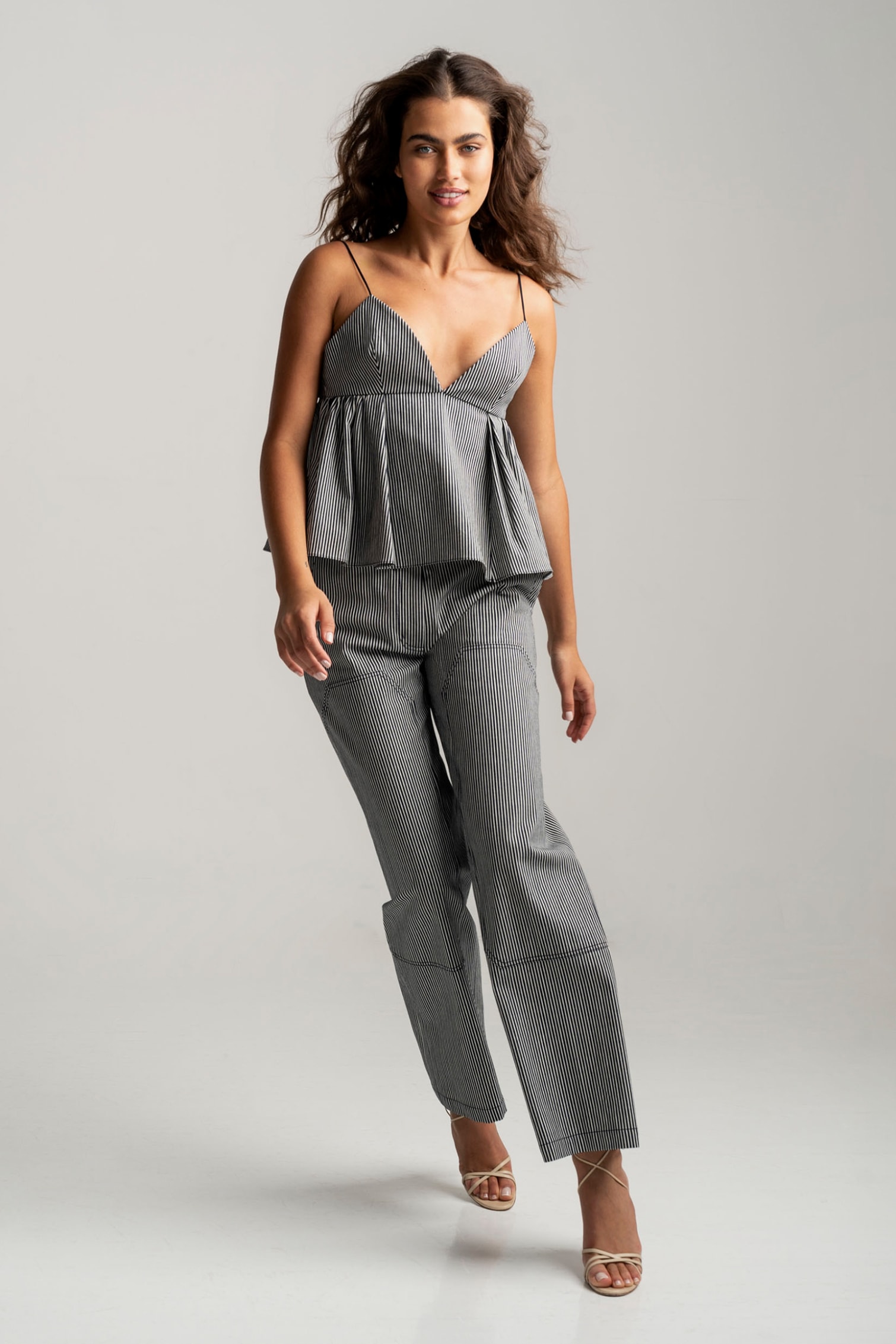 ADAM LIPPES Denim Top & Bottoms. MANOLO BLAHNIK Sandals