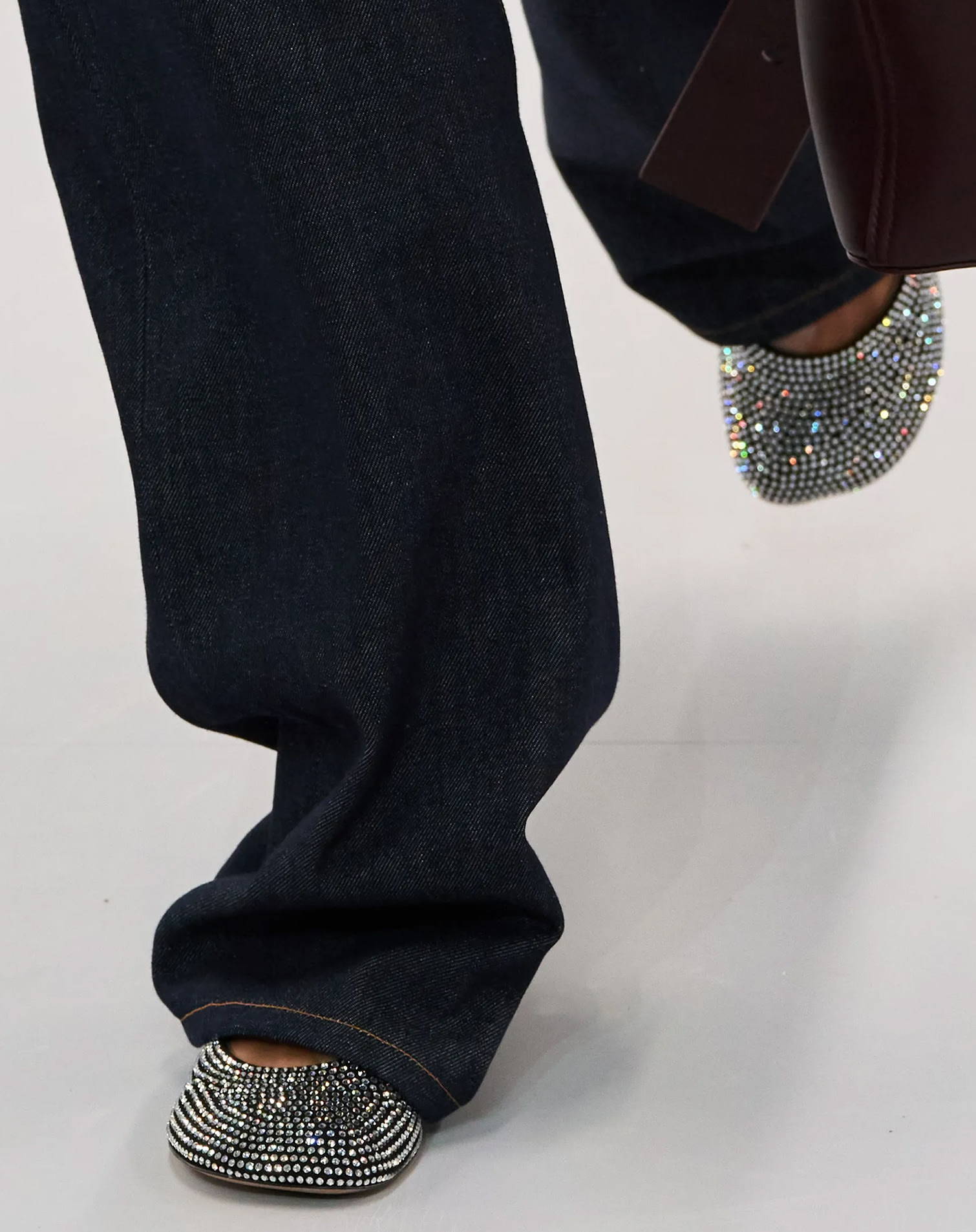 Sequined ballerina flats on runways