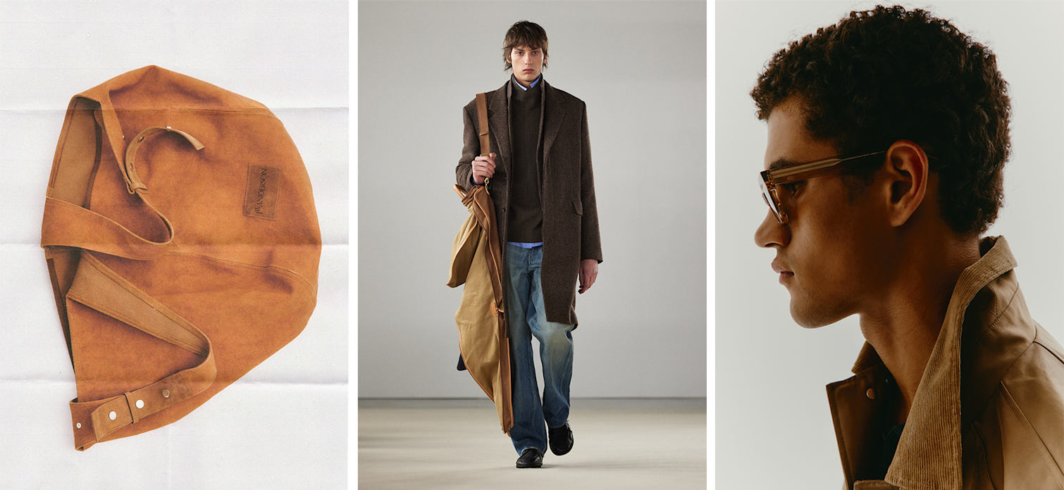 JW Anderson Maxi tote bag in caramel brown color, Model wears Auralee runway look of a long brown coat and jeans with black shoes and a beige garment bag, model’s face in profile wearing Chimi 11 squared acetate sunglasses in a neutral color