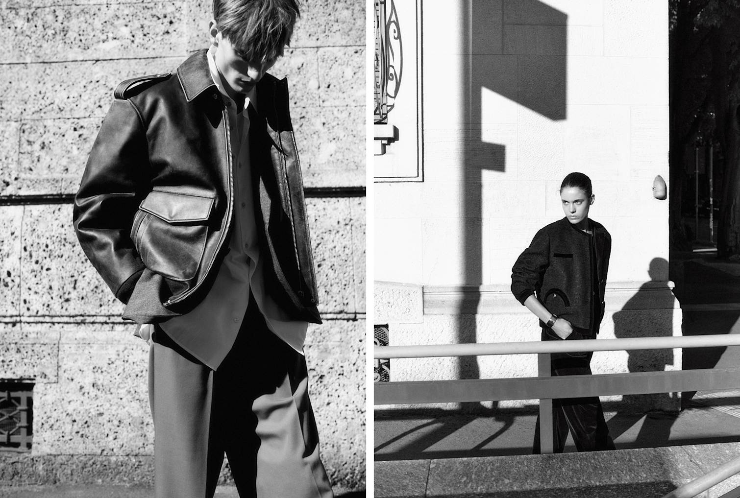 Das männliche Model trägt eine Bomberjacke aus Leder und ein Button-Down-Hemd. Das weibliche Model trägt eine Bolero-Bouclé-Jacke von Blazé Milano.