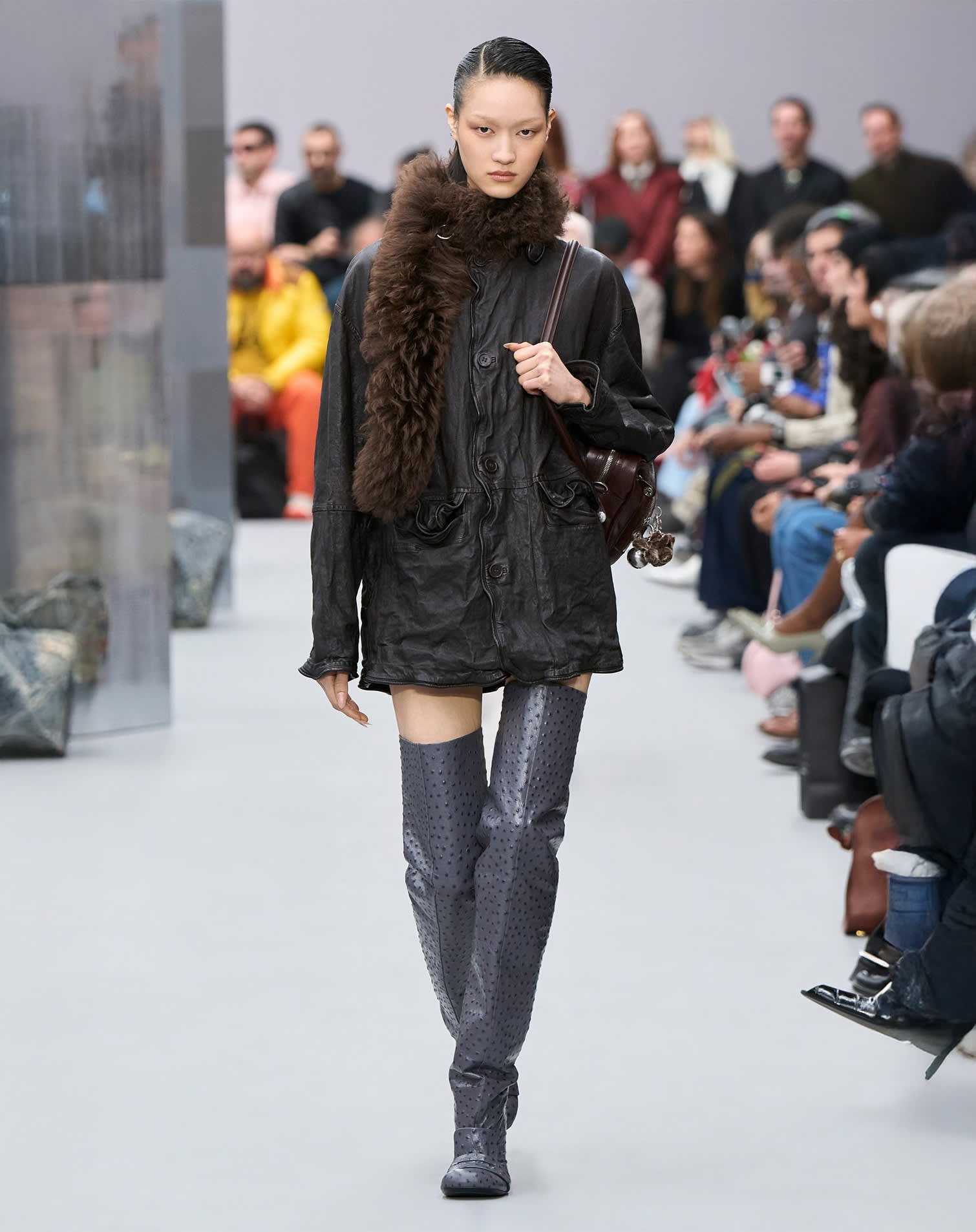 Leather coat and over-the-knee ostrich leather boots