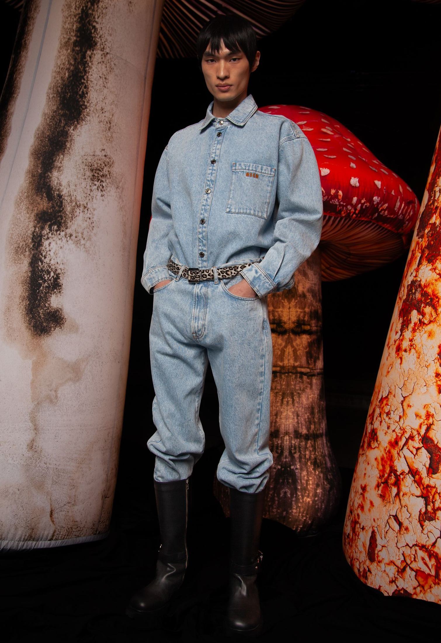 Light wash denim shirt and jeans with dark boots by MSGM