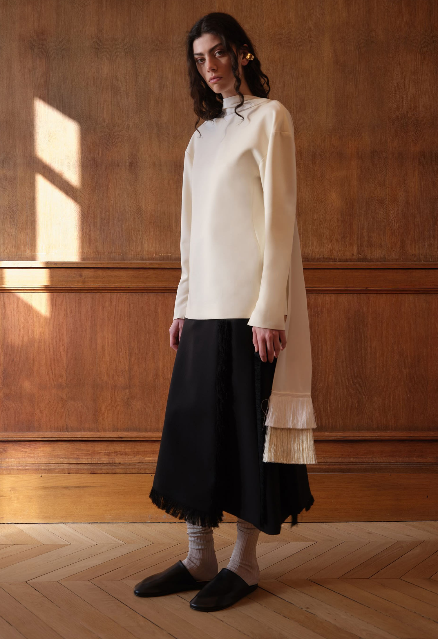 Model with soft black leather slippers