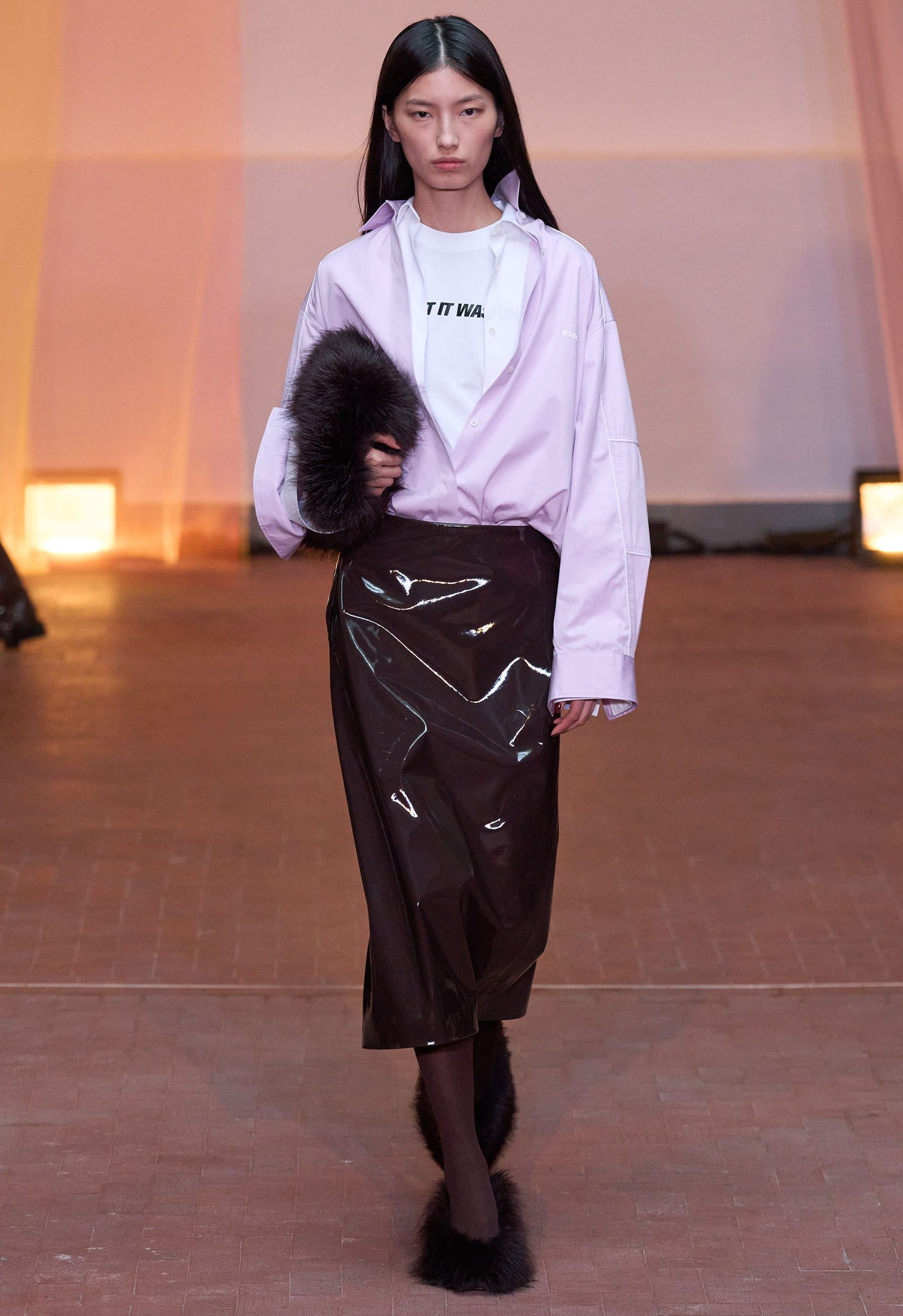 Model with long black fur heel shoes