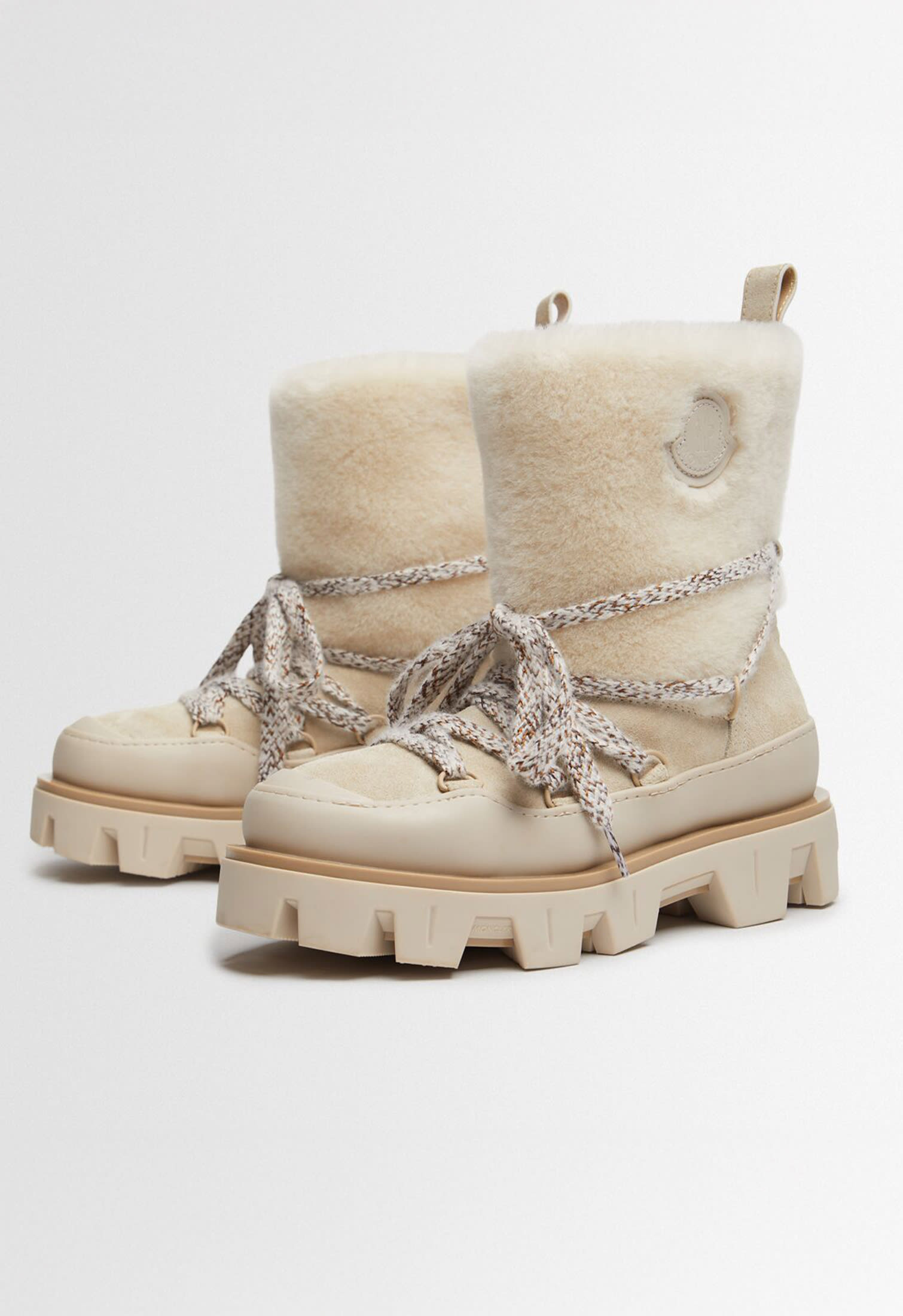 Still life photo of Moncler Grenoble withe boots with shearling
